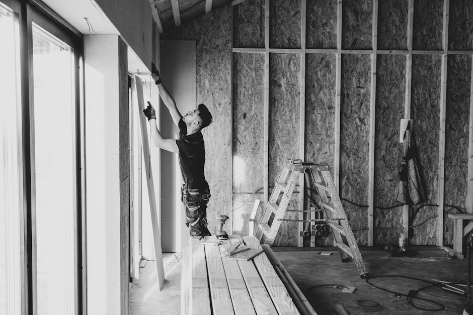 Professional contractor measuring and installing custom window shades